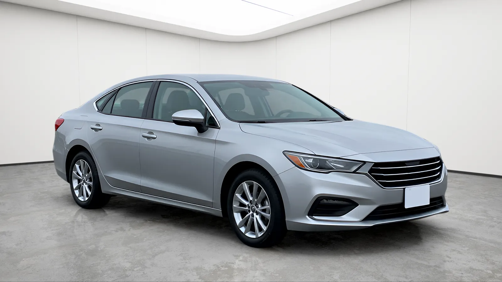 The same sedan in a white cove.